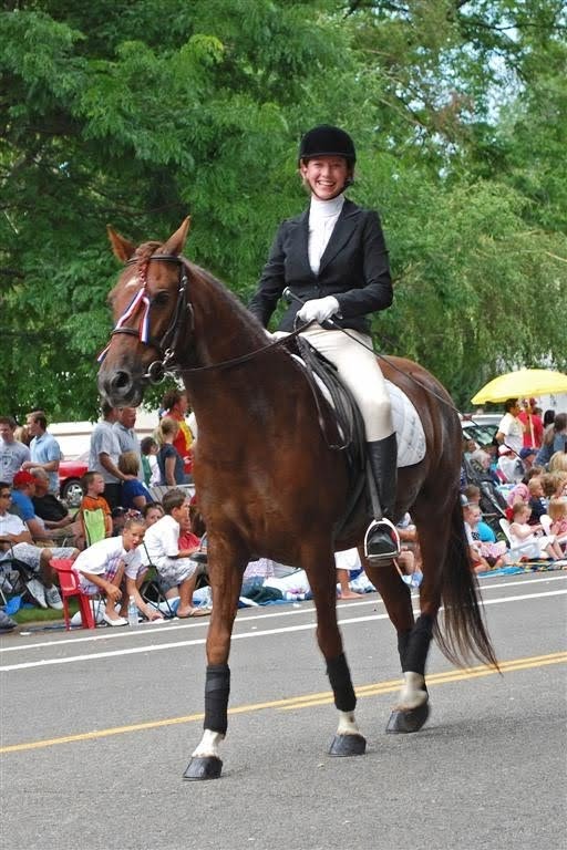 Kelty riding a horse